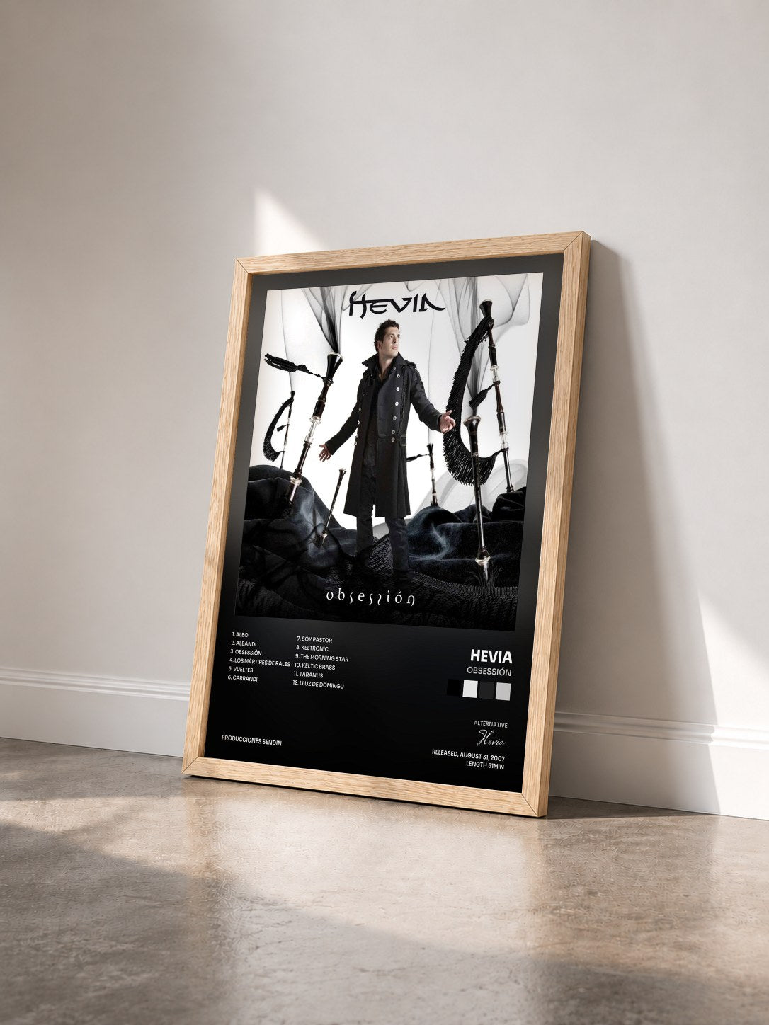 #bois Tableau de l'album Obsessión de Hevia vu de trois quarts, cadre en bois brut