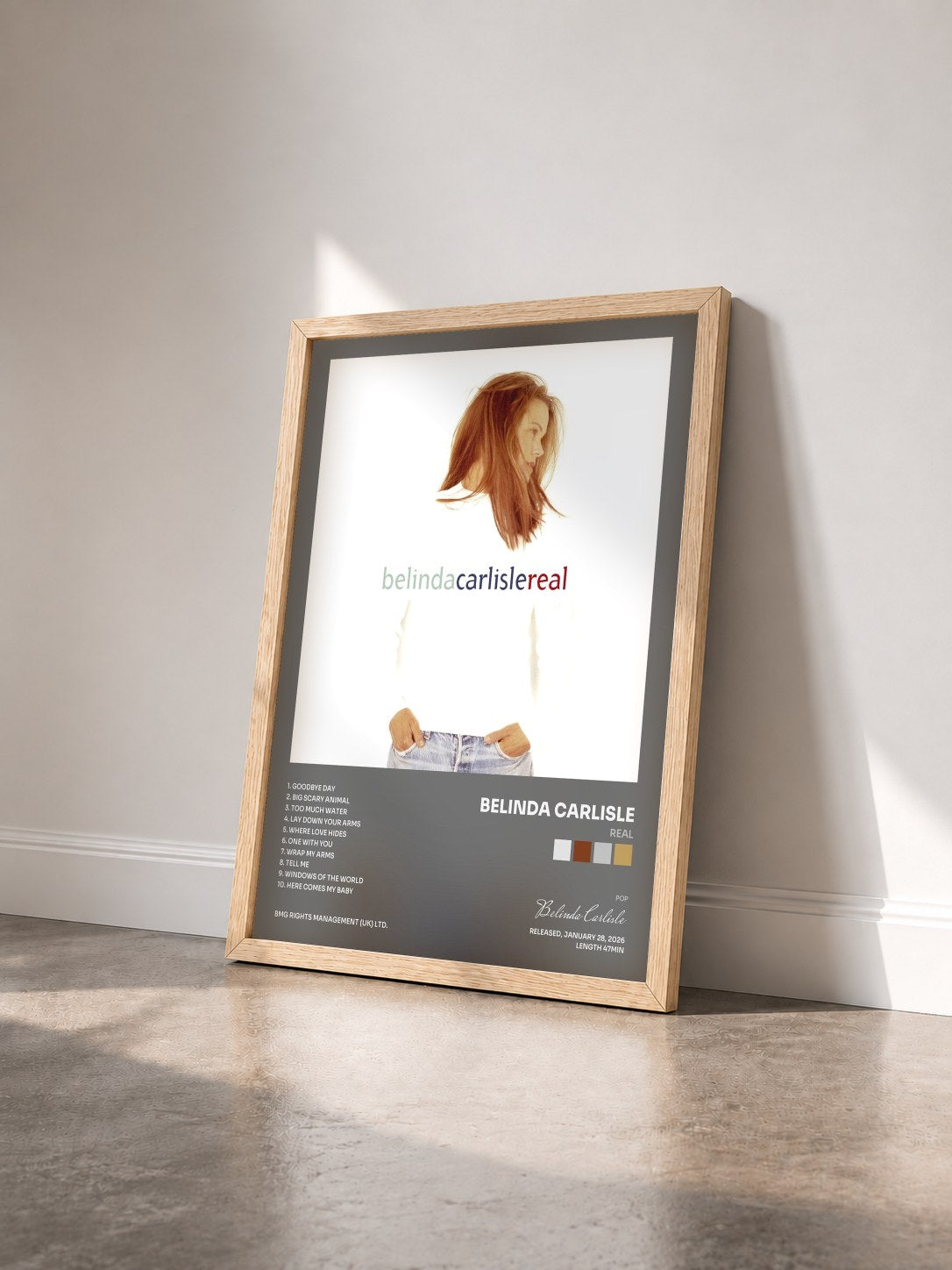 #bois Tableau de l'album Real de Belinda Carlisle vu de trois quarts, cadre en bois brut