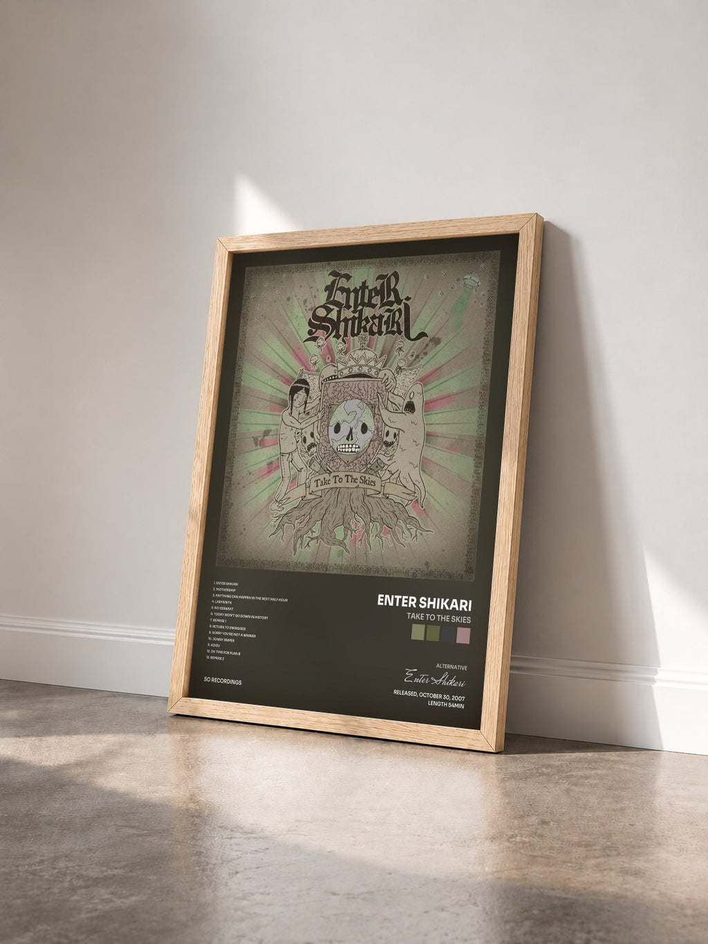 #bois Tableau de l'album Take to the Skies de Enter Shikari vu de trois quarts, cadre en bois brut