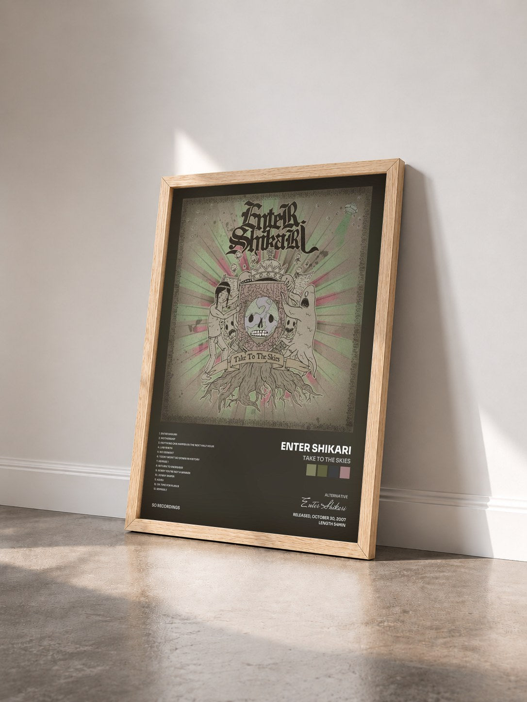 #bois Tableau de l'album Take to the Skies de Enter Shikari vu de trois quarts, cadre en bois brut