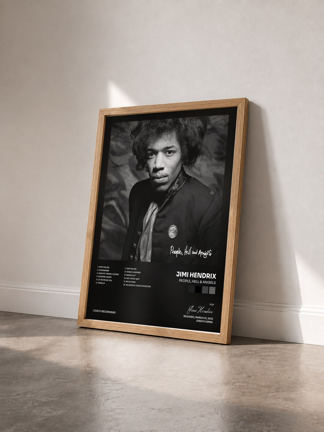 #bois Tableau de l'album People, Hell & Angels de Jimi Hendrix vu de trois quarts, cadre en bois brut