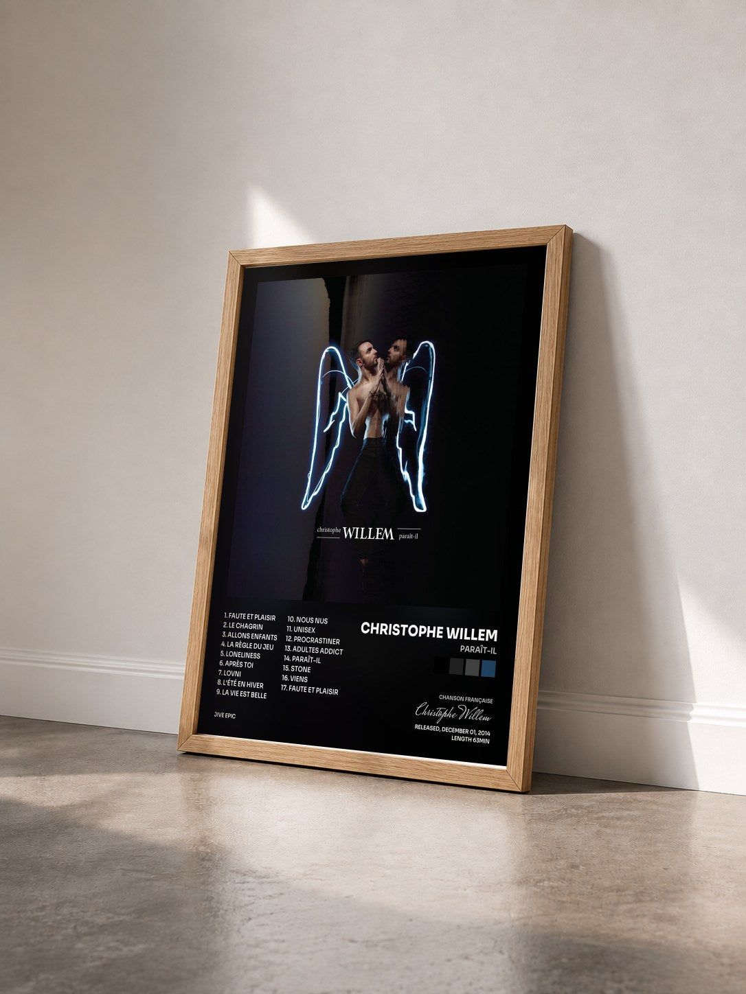 #bois Tableau de l'album Paraît-il de Christophe Willem vu de trois quarts, cadre en bois brut