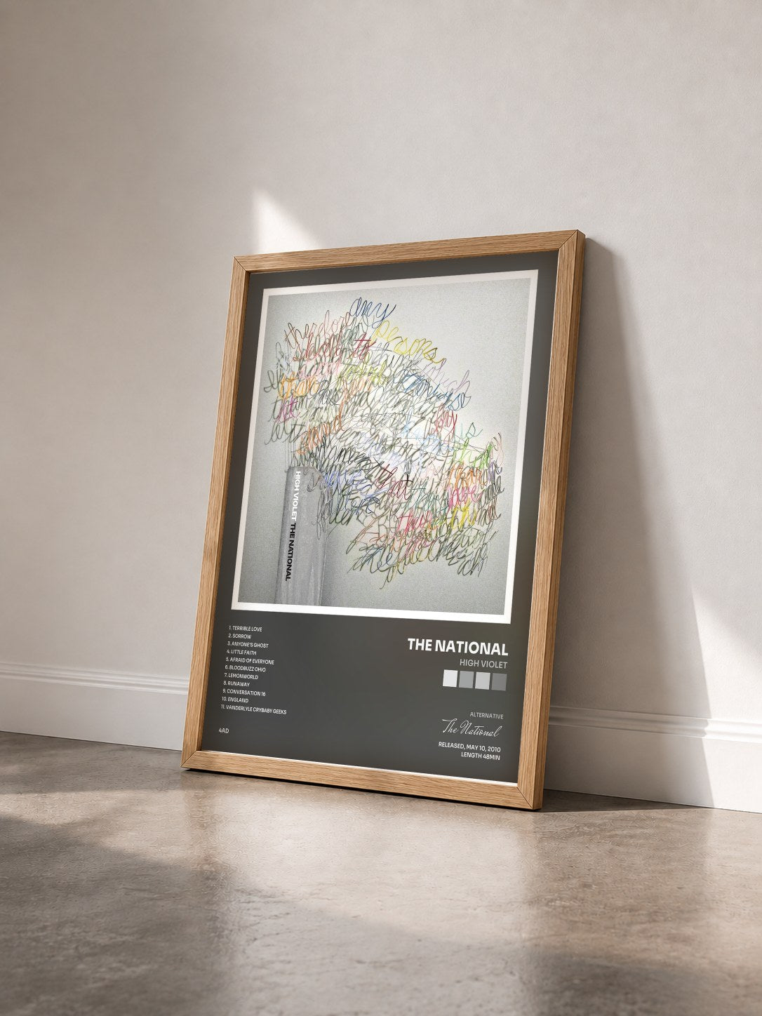 #bois Tableau de l'album High Violet de The National vu de trois quarts, cadre en bois brut