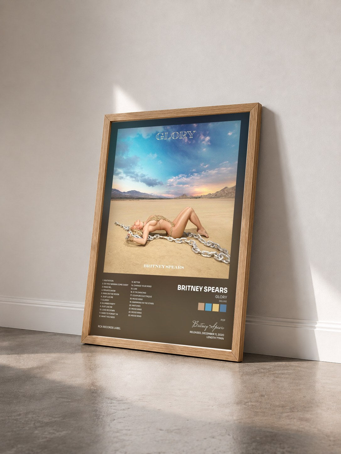 #bois Tableau de l'album Glory (Deluxe) de Britney Spears vu de trois quarts, cadre en bois brut