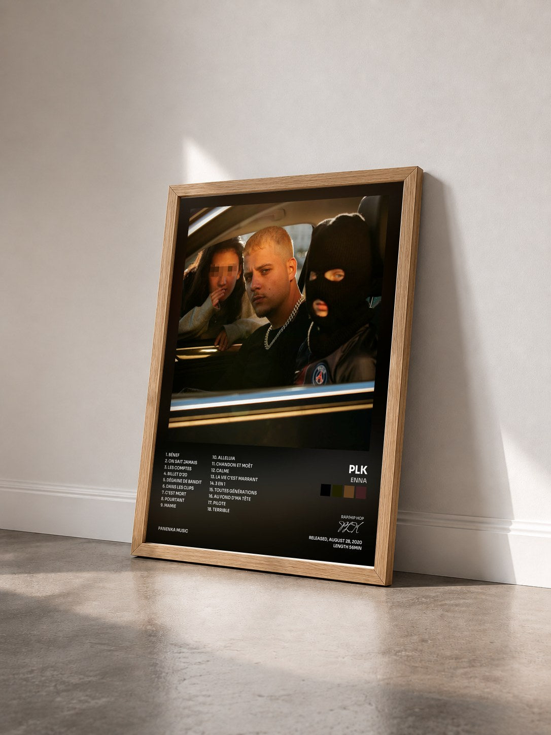 #bois Tableau de l'album Enna de PLK vu de trois quarts, cadre en bois brut