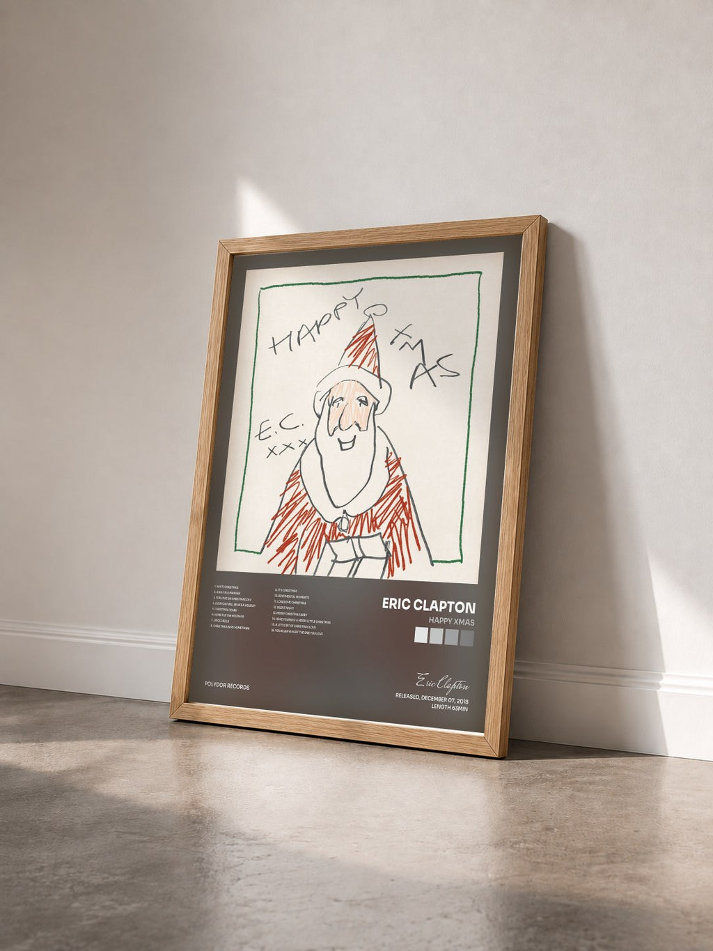 #bois Tableau de l'album Happy Xmas de Eric Clapton vu de trois quarts, cadre en bois brut