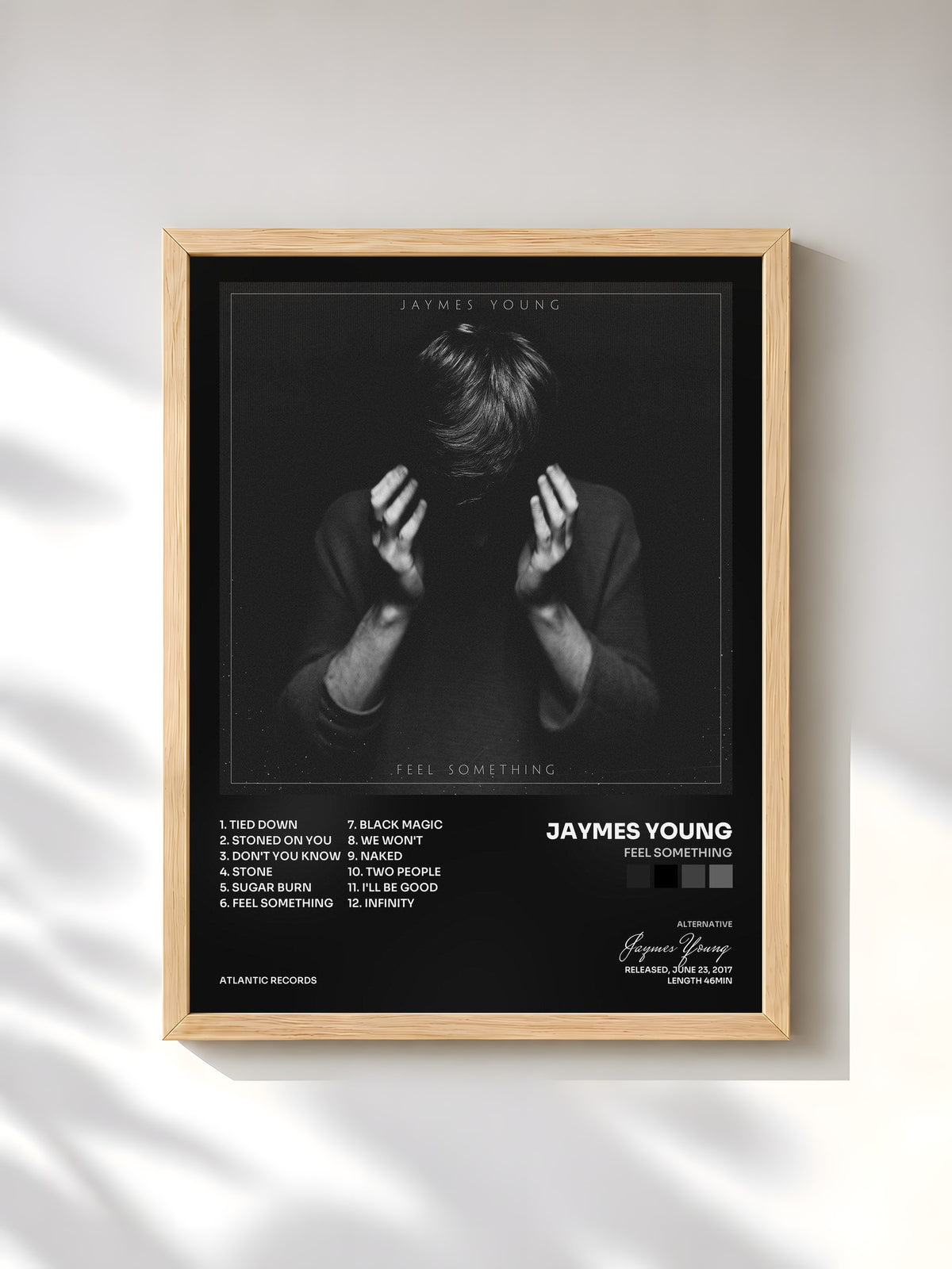 #bois Tableau de l'album Feel Something de Jaymes Young, cadre en bois brut, imprimé et encadré en France