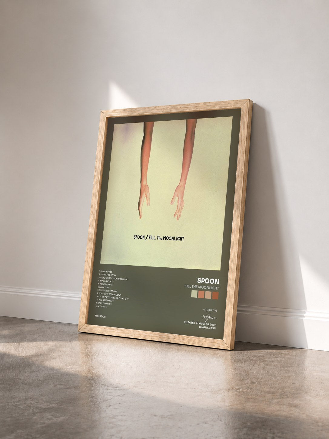 #bois Tableau de l'album Kill the Moonlight de Spoon vu de trois quarts, cadre en bois brut