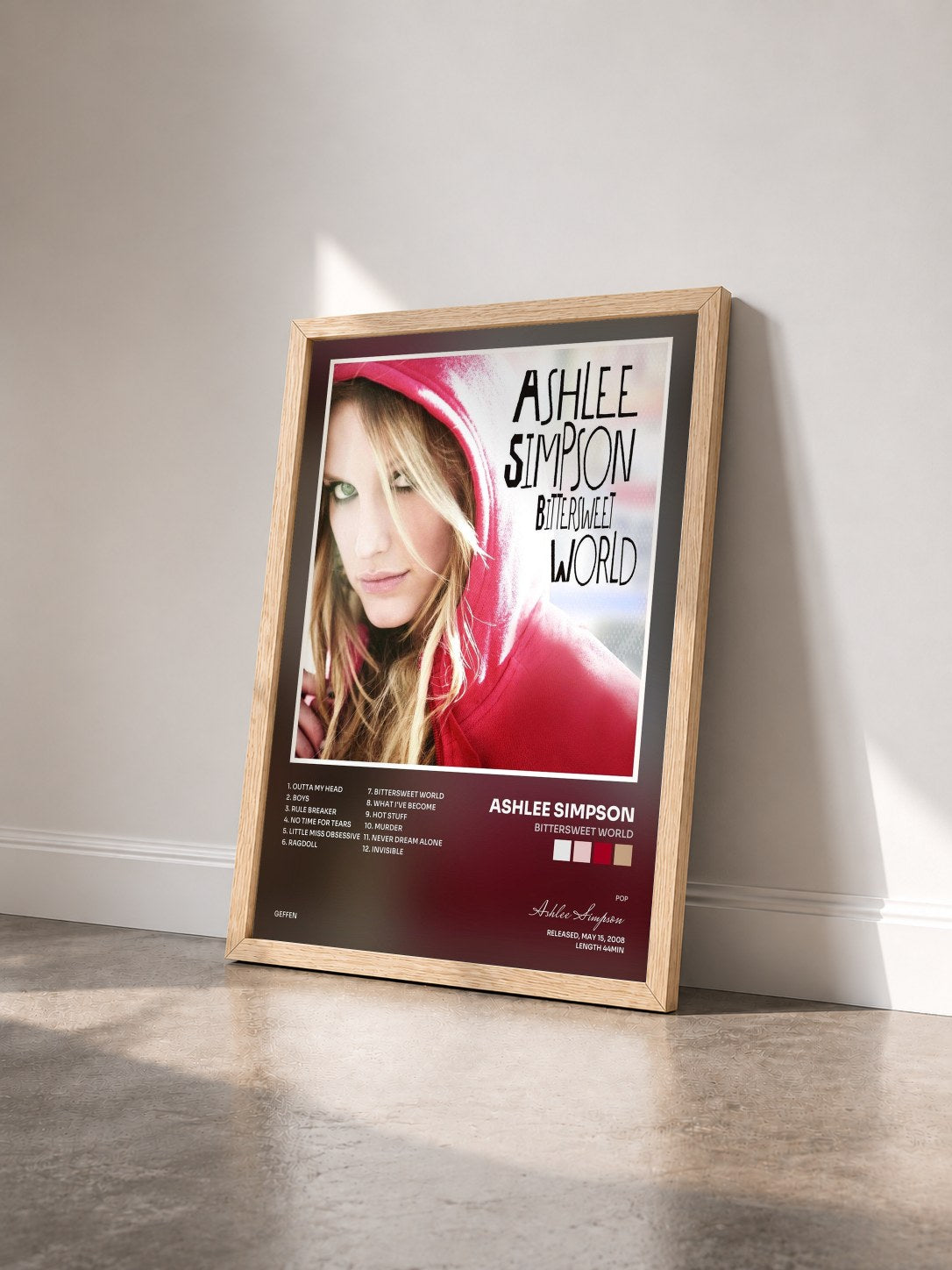#bois Tableau de l'album Bittersweet World de Ashlee Simpson vu de trois quarts, cadre en bois brut