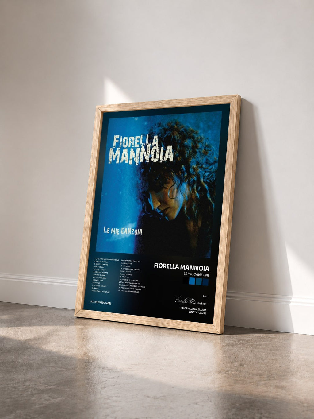 #bois Tableau de l'album Le Mie Canzoni de Fiorella Mannoia vu de trois quarts, cadre en bois brut