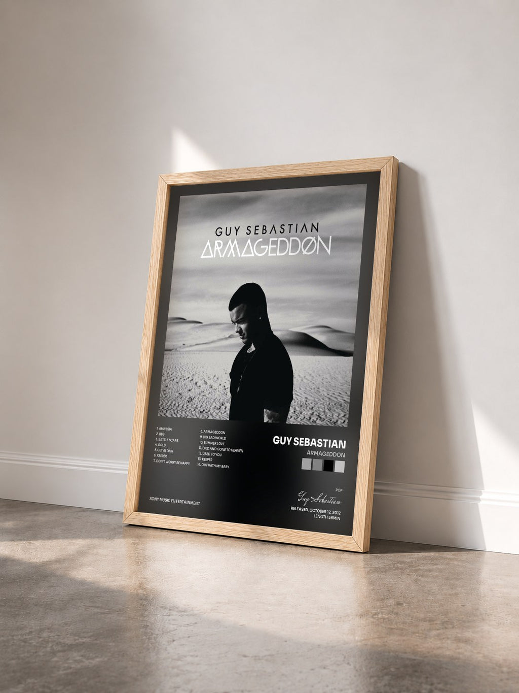 #bois Tableau de l'album Armageddon de Guy Sebastian vu de trois quarts, cadre en bois brut