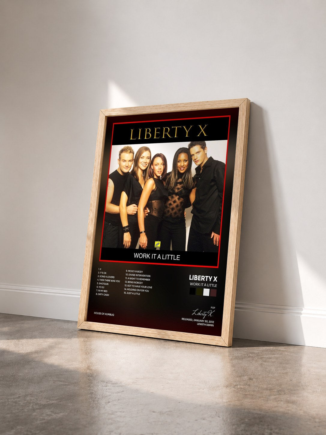 #bois Tableau de l'album Work It A Little de Liberty X vu de trois quarts, cadre en bois brut