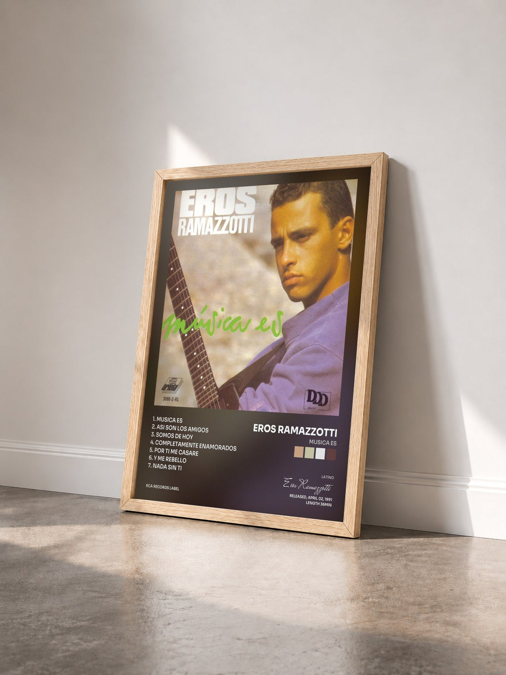 #bois Tableau de l'album Musica Es de Eros Ramazzotti vu de trois quarts, cadre en bois brut