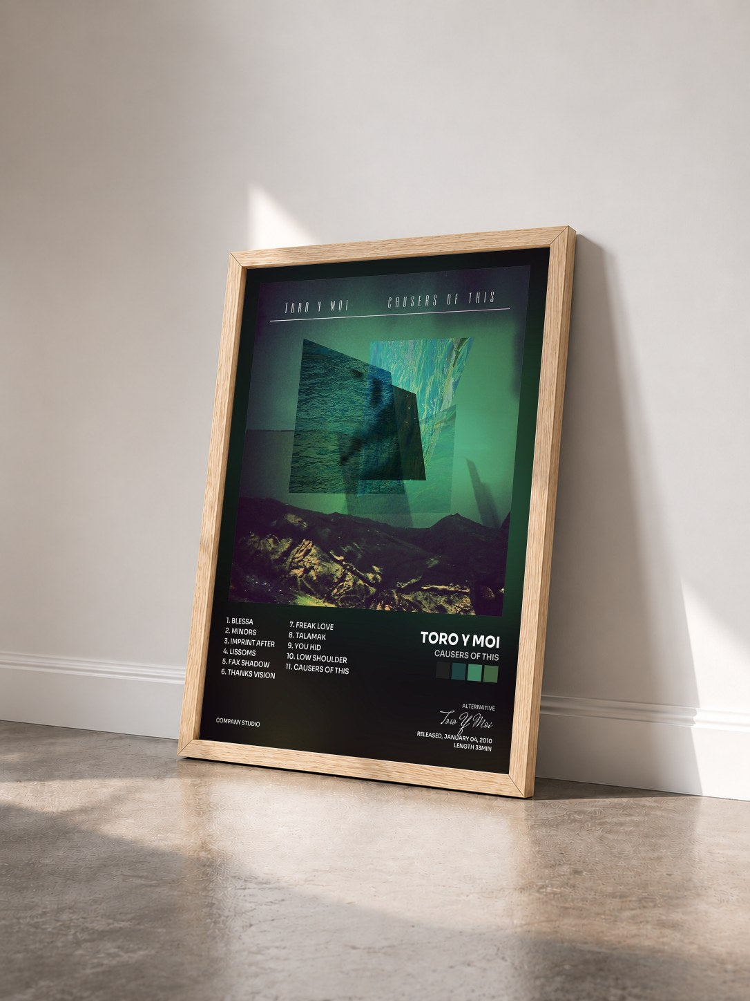 #bois Tableau de l'album Causers Of This de Toro Y Moi vu de trois quarts, cadre en bois brut