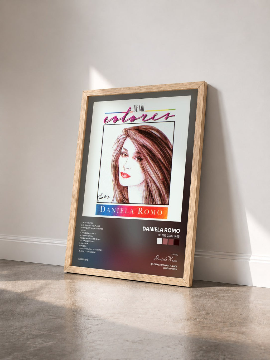 #bois Tableau de l'album De Mil Colores de Daniela Romo vu de trois quarts, cadre en bois brut