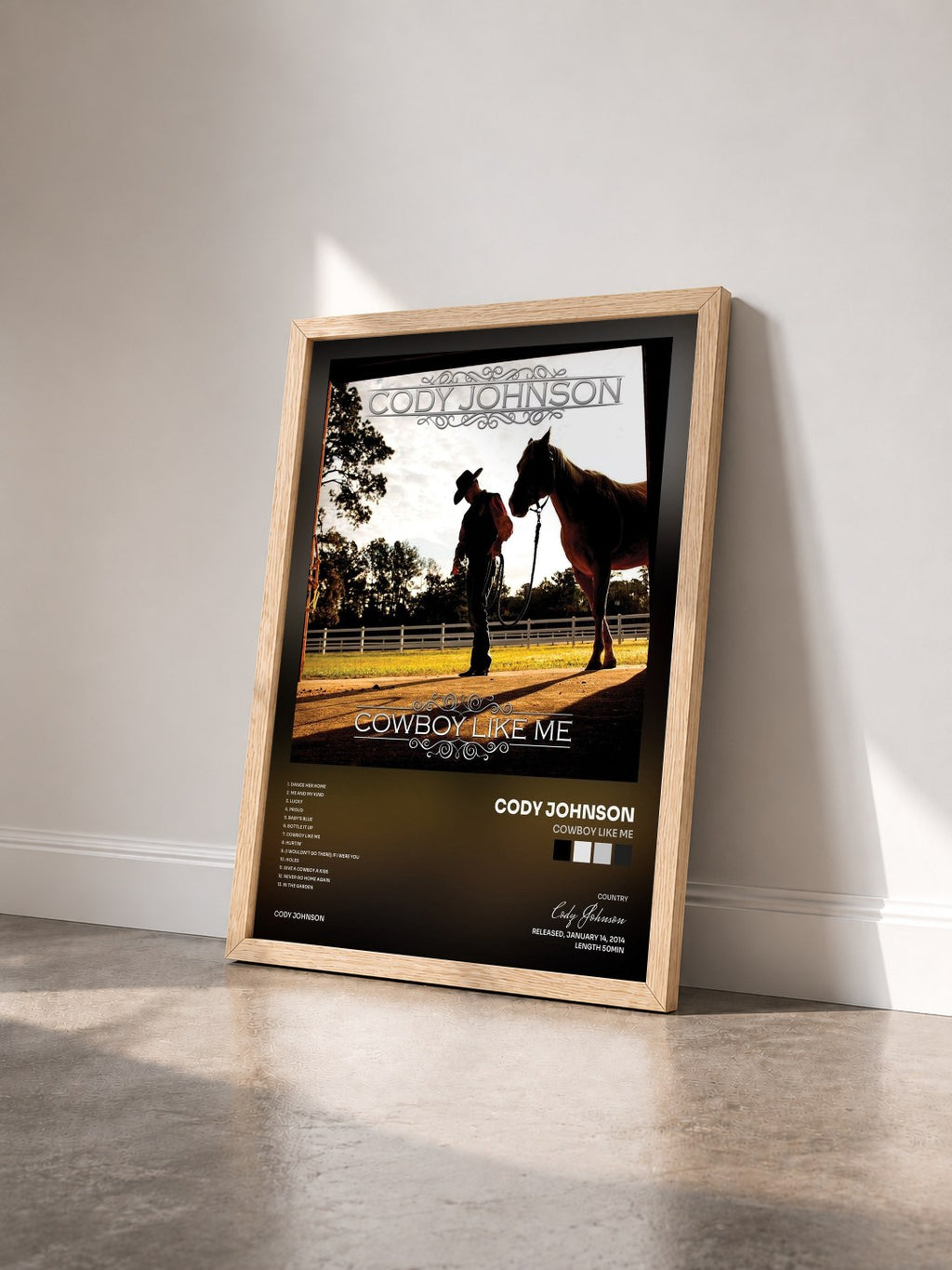 #bois Tableau de l'album Cowboy Like Me de Cody Johnson vu de trois quarts, cadre en bois brut