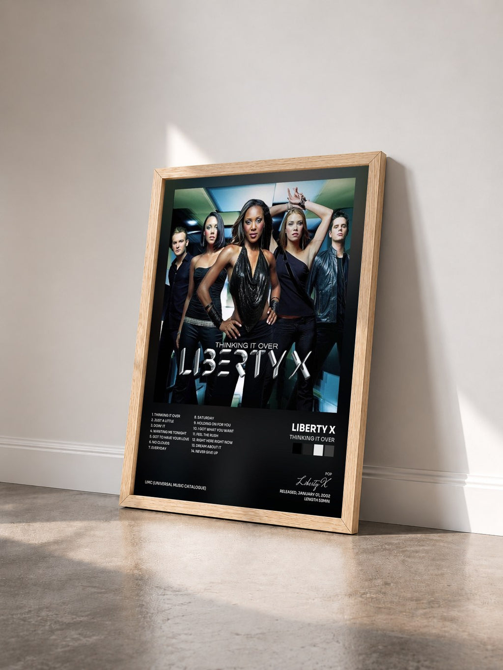 #bois Tableau de l'album Thinking It Over de Liberty X vu de trois quarts, cadre en bois brut