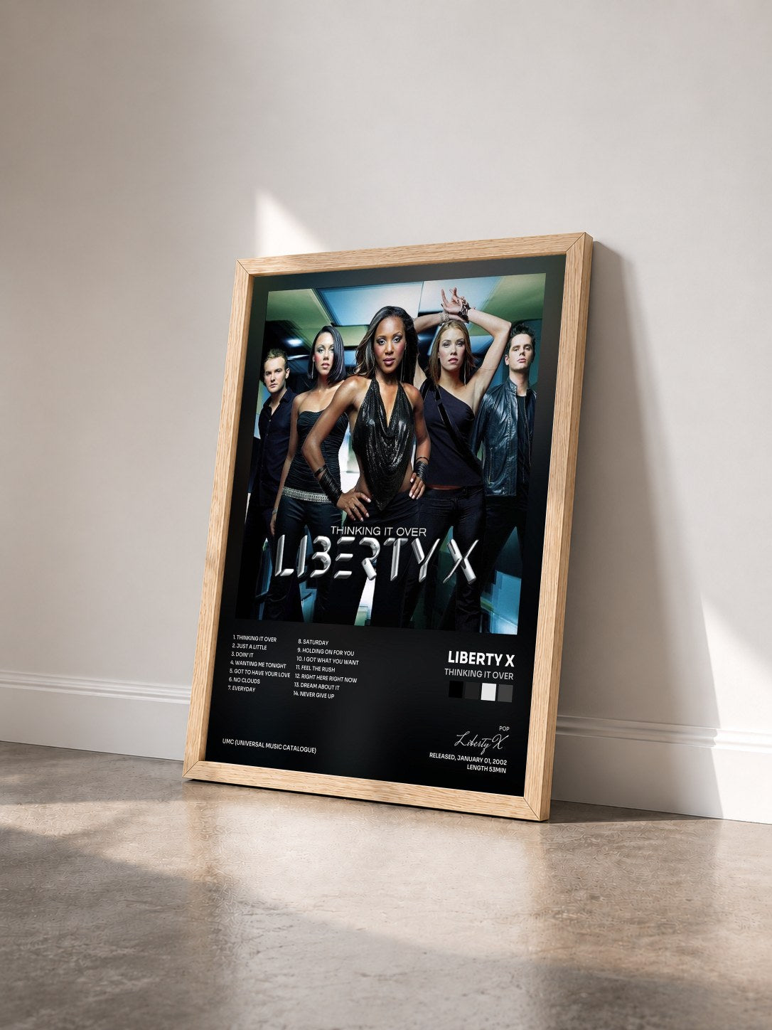 #bois Tableau de l'album Thinking It Over de Liberty X vu de trois quarts, cadre en bois brut