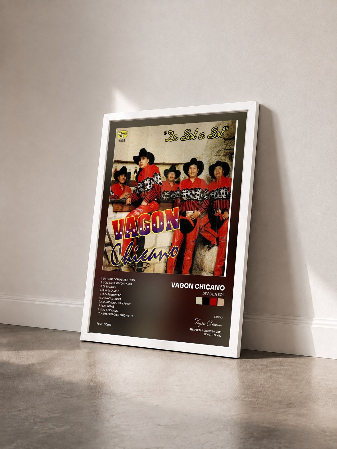#blanc Tableau de l'album De Sol a Sol de Vagon Chicano vu de trois quarts, cadre blanc
