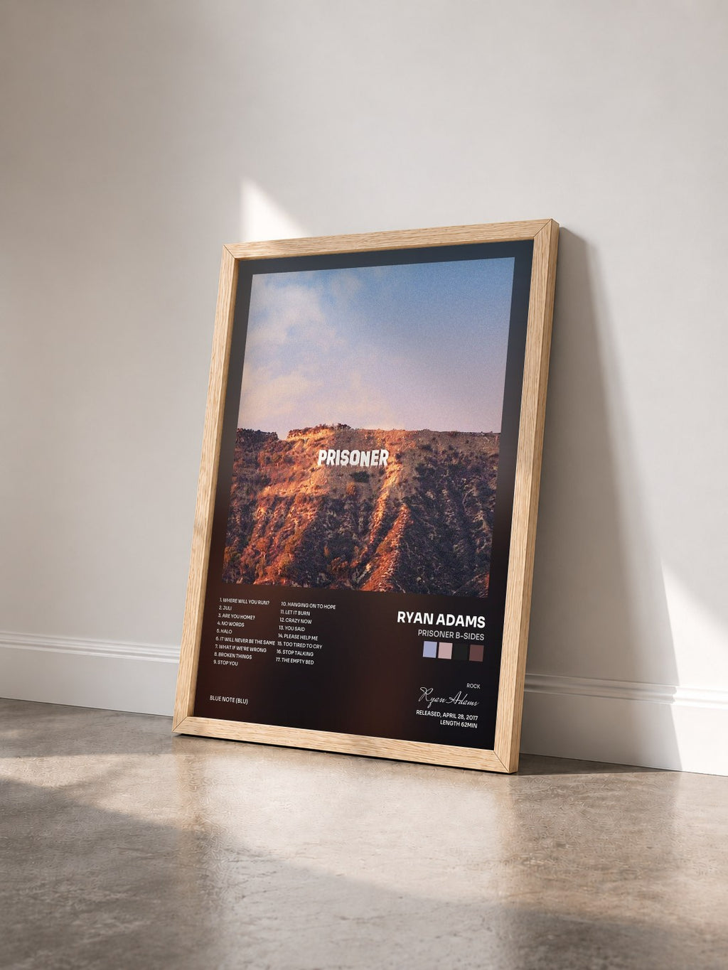 #bois Tableau de l'album Prisoner B-Sides de Ryan Adams vu de trois quarts, cadre en bois brut