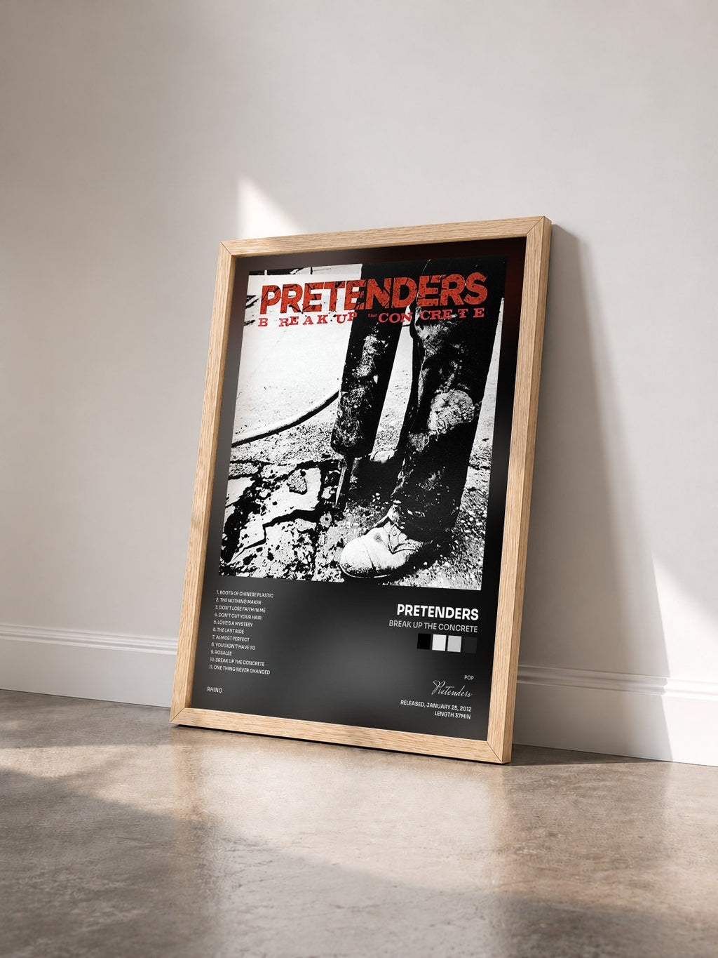 #bois Tableau de l'album Break Up the Concrete de Pretenders vu de trois quarts, cadre en bois brut