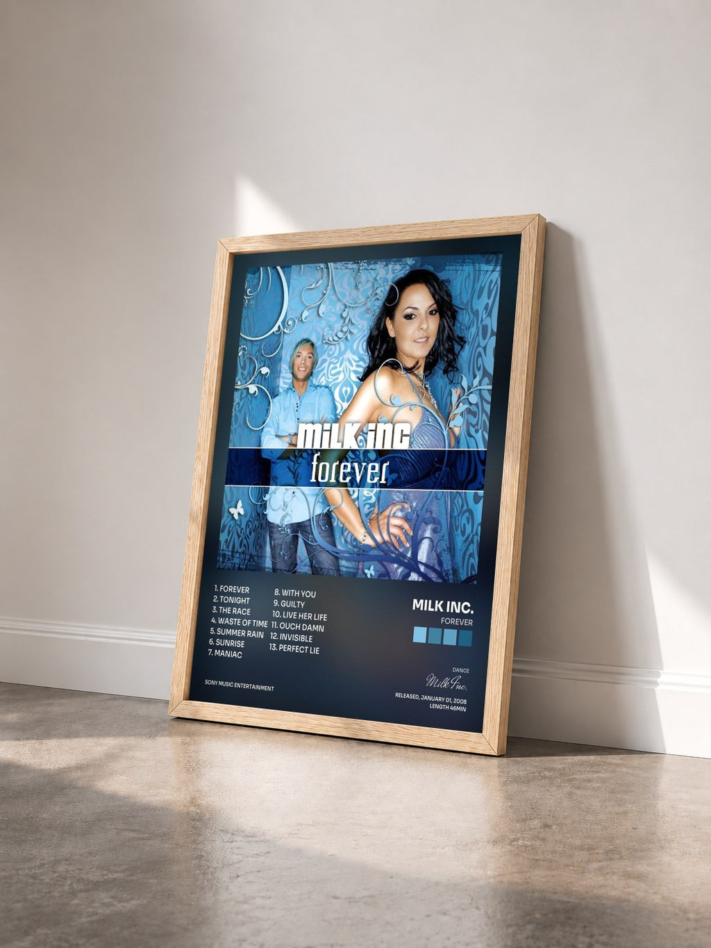 #bois Tableau de l'album Forever de Milk Inc. vu de trois quarts, cadre en bois brut