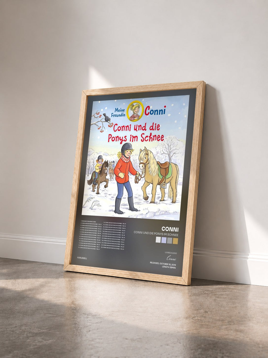 #bois Tableau de l'album Conni und die Ponys im Schnee de Conni vu de trois quarts, cadre en bois brut