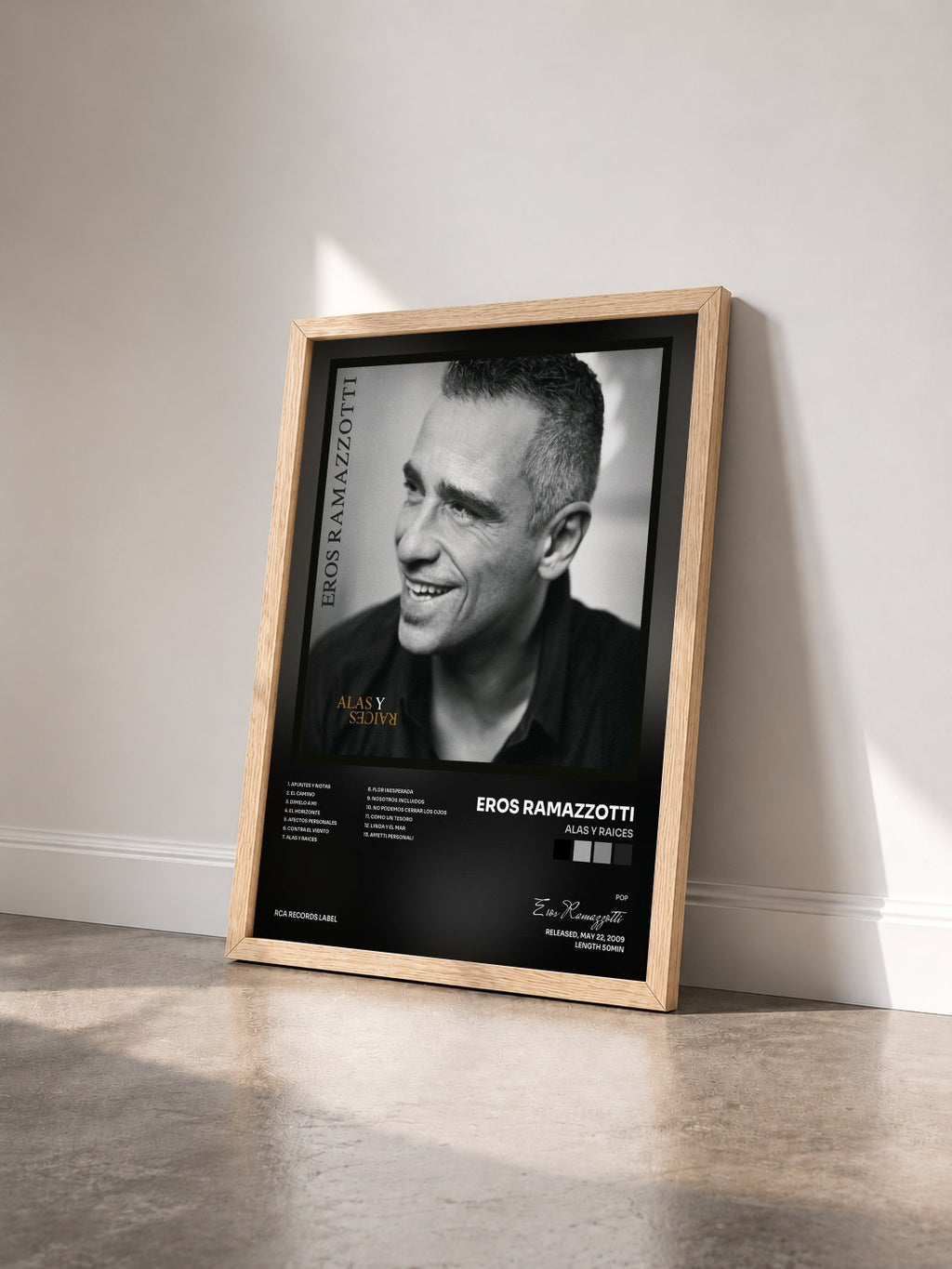 #bois Tableau de l'album Alas Y Raices de Eros Ramazzotti vu de trois quarts, cadre en bois brut