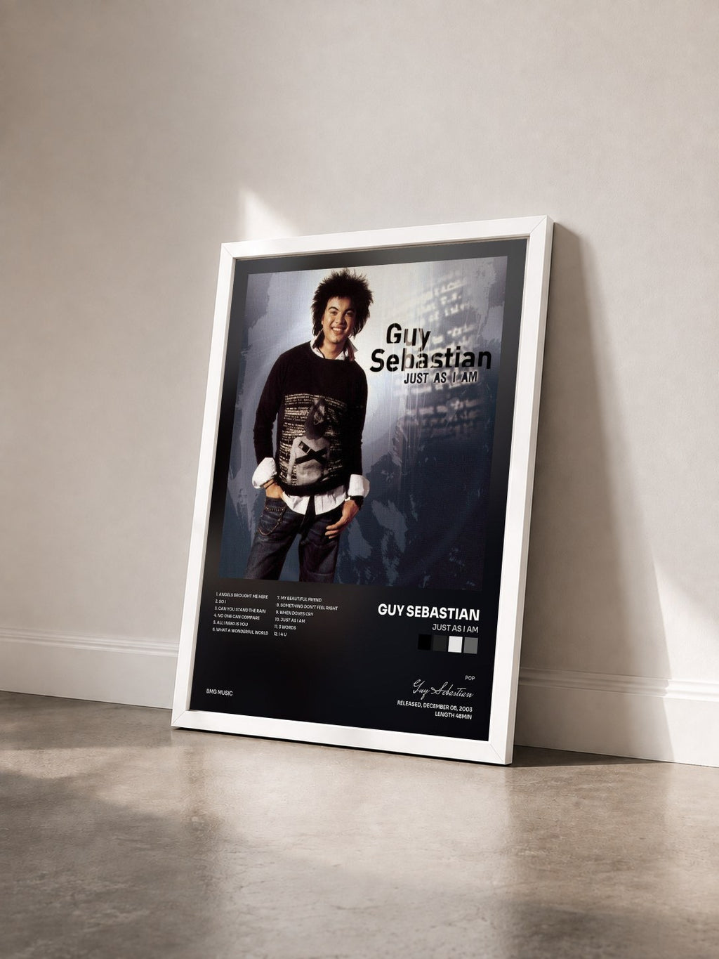 #blanc Tableau de l'album Just As I Am de Guy Sebastian vu de trois quarts, cadre blanc