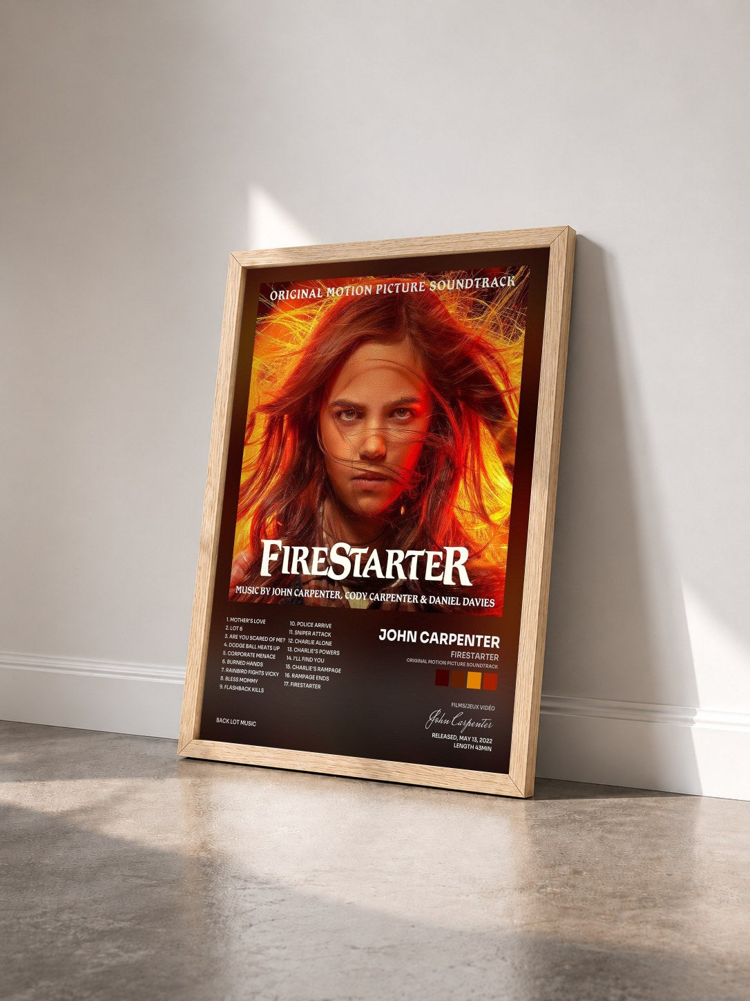 #bois Tableau de l'album Firestarter (Original Motion Picture Soundtrack) de John Carpenter vu de trois quarts, cadre en bois brut