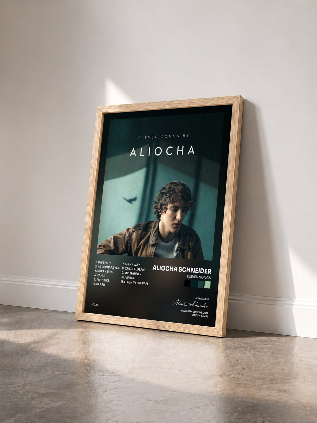 #bois Tableau de l'album Eleven Songs de Aliocha Schneider vu de trois quarts, cadre en bois brut