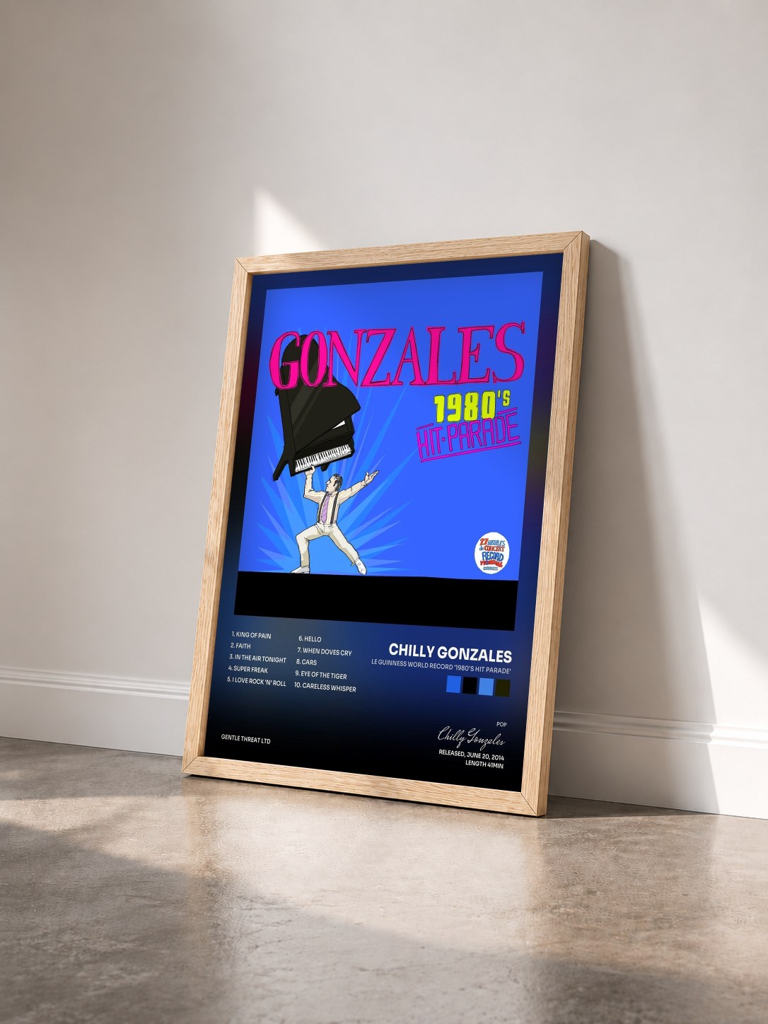 #bois Tableau de l'album Le Guinness World Record '1980's Hit Parade' de Chilly Gonzales vu de trois quarts, cadre en bois brut