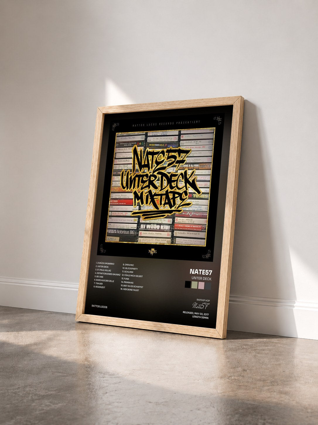 #bois Tableau de l'album Unter Deck de Nate57 vu de trois quarts, cadre en bois brut