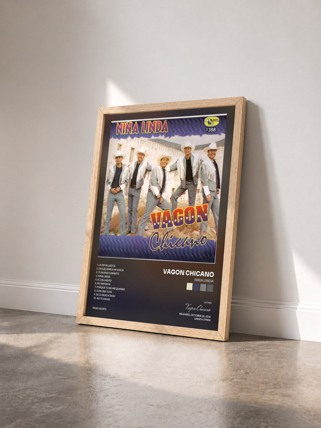 #bois Tableau de l'album Nina Linda de Vagon Chicano vu de trois quarts, cadre en bois brut