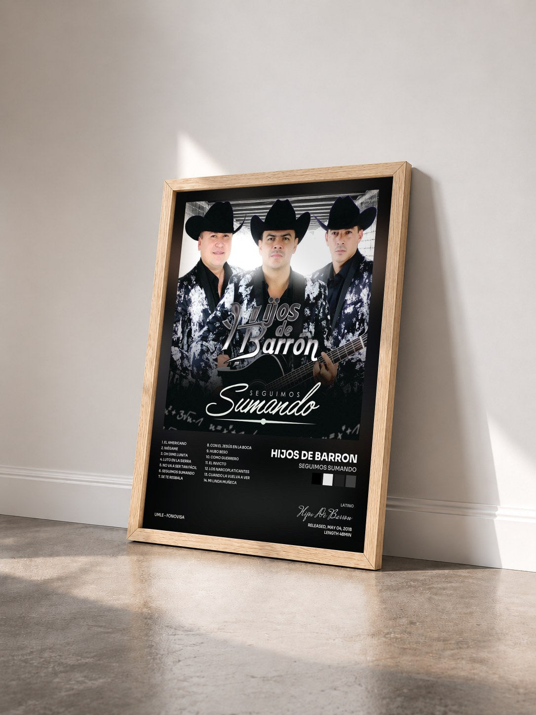 #bois Tableau de l'album Seguimos Sumando de Hijos De Barron vu de trois quarts, cadre en bois brut