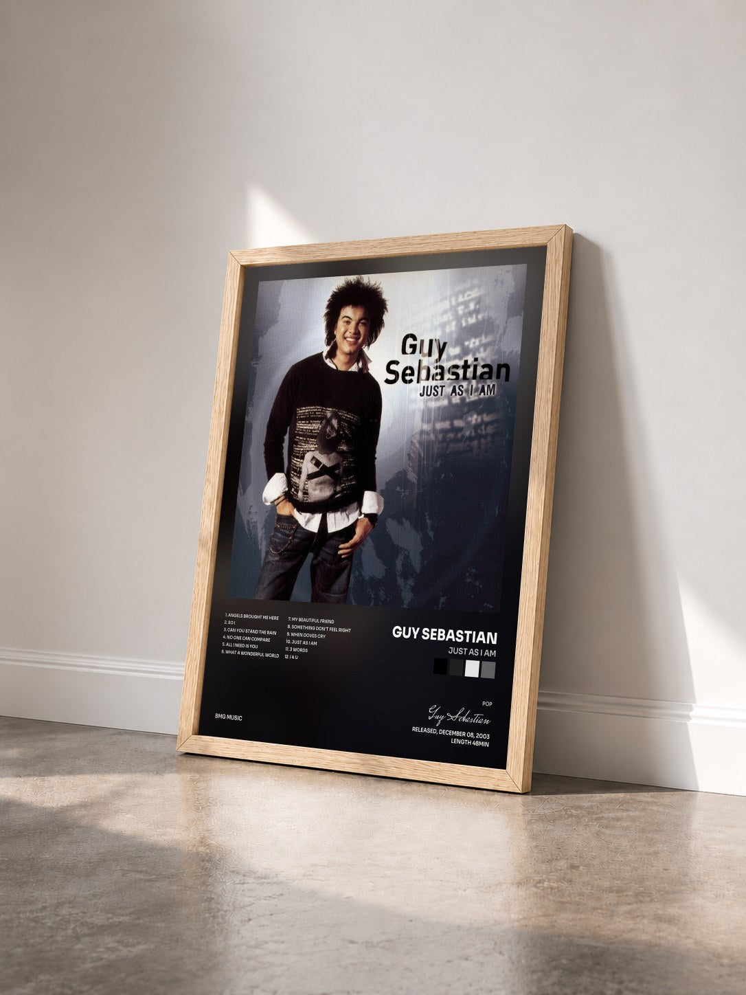 #bois Tableau de l'album Just As I Am de Guy Sebastian vu de trois quarts, cadre en bois brut