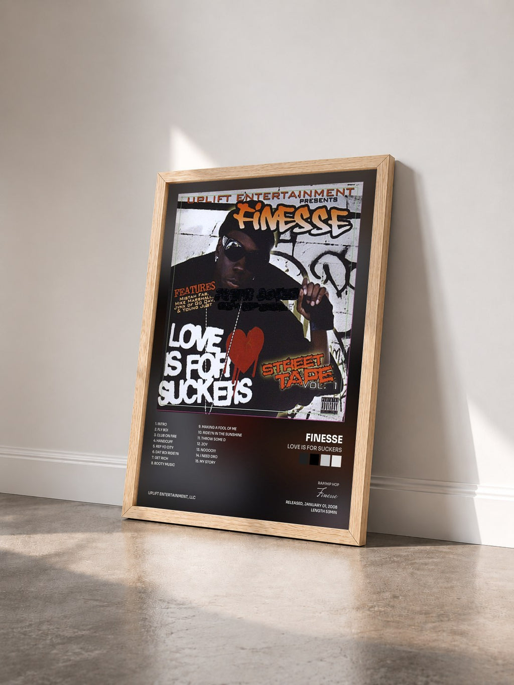 #bois Tableau de l'album Love is For Suckers de Finesse vu de trois quarts, cadre en bois brut