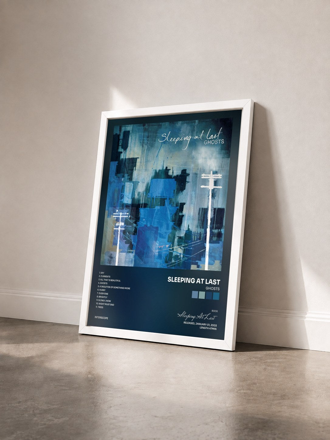 #blanc Tableau de l'album Ghosts de Sleeping At Last vu de trois quarts, cadre blanc