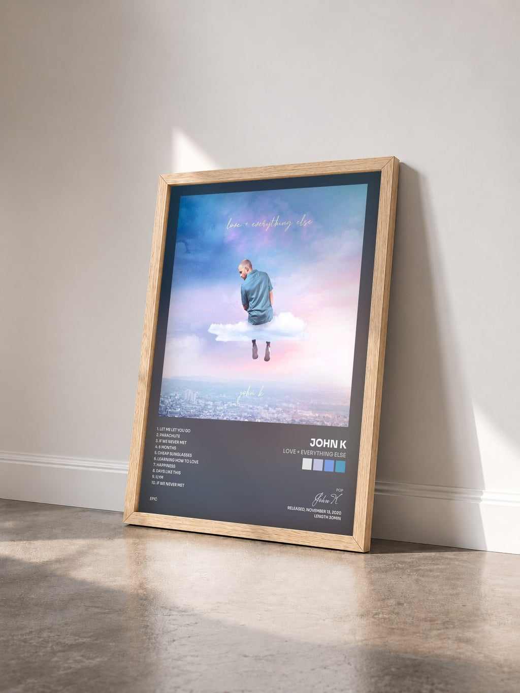 #bois Tableau de l'album love + everything else de John K vu de trois quarts, cadre en bois brut
