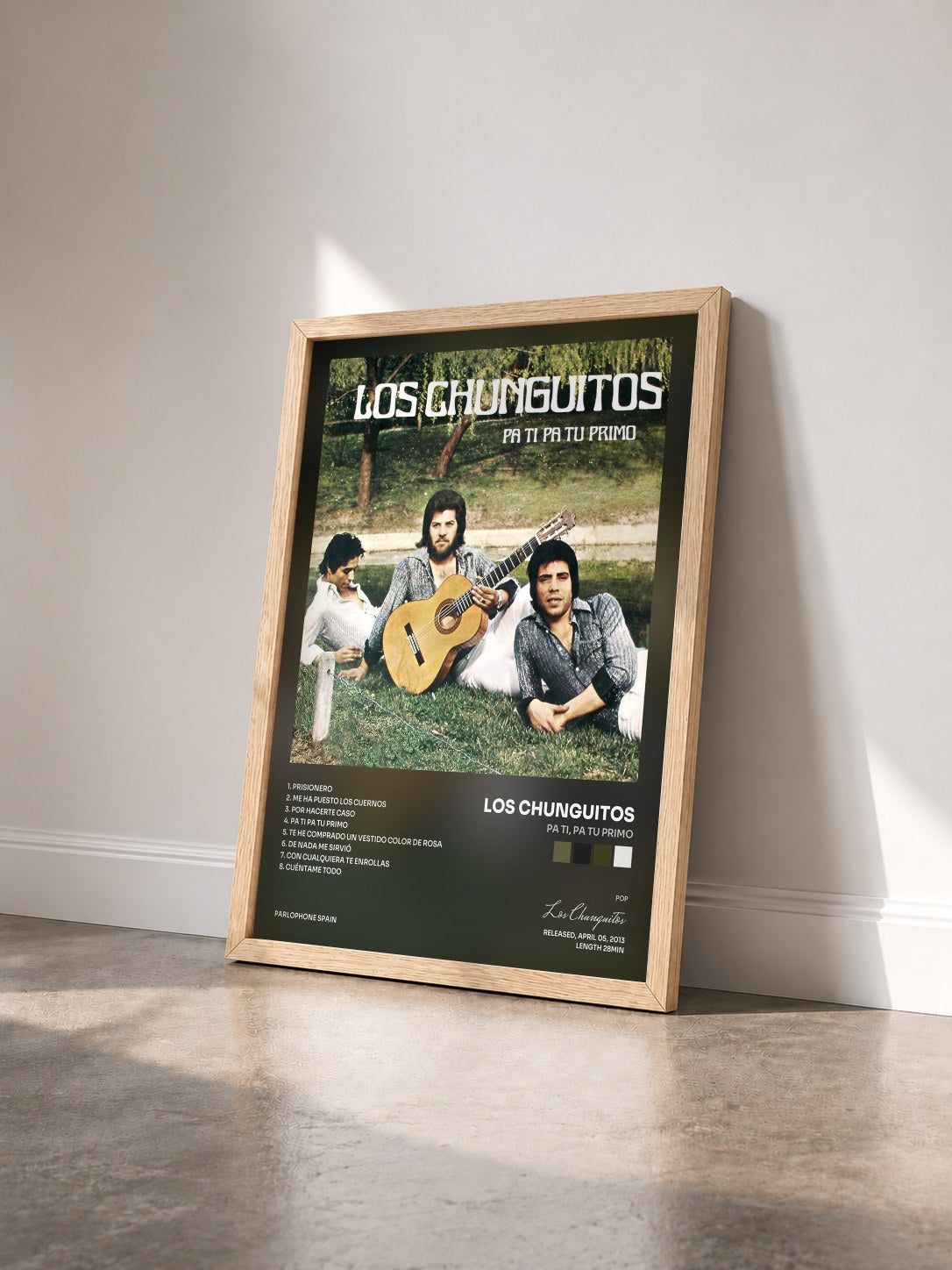 #bois Tableau de l'album Pa Ti, Pa Tu Primo de Los Chunguitos vu de trois quarts, cadre en bois brut