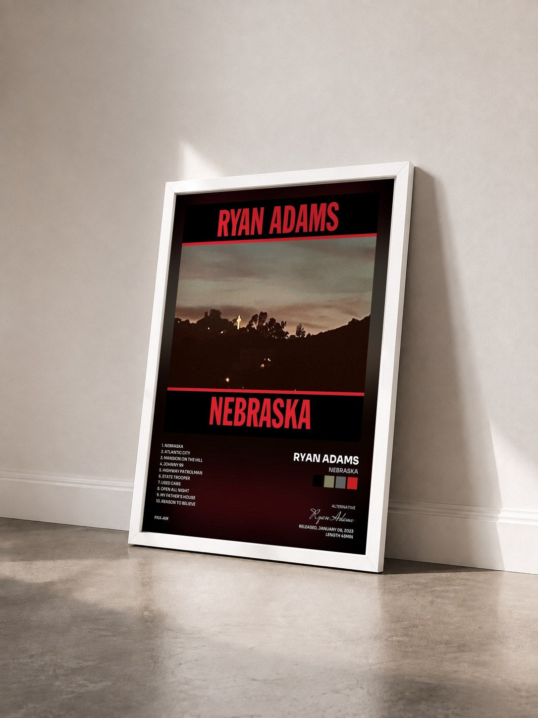 #blanc Tableau de l'album Nebraska de Ryan Adams vu de trois quarts, cadre blanc