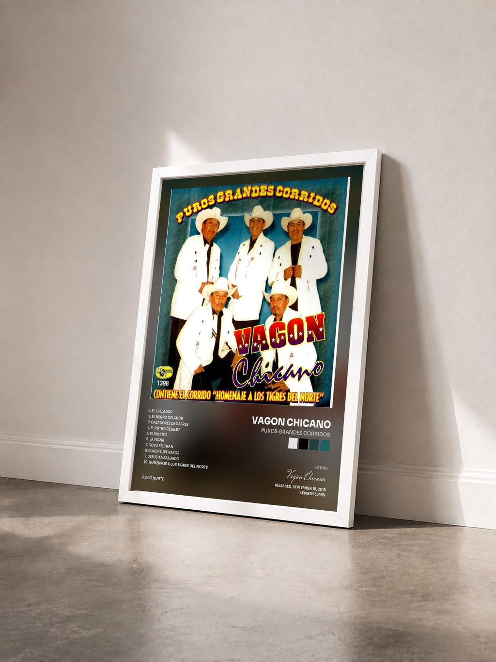 #blanc Tableau de l'album Puros Grandes Corridos de Vagon Chicano vu de trois quarts, cadre blanc