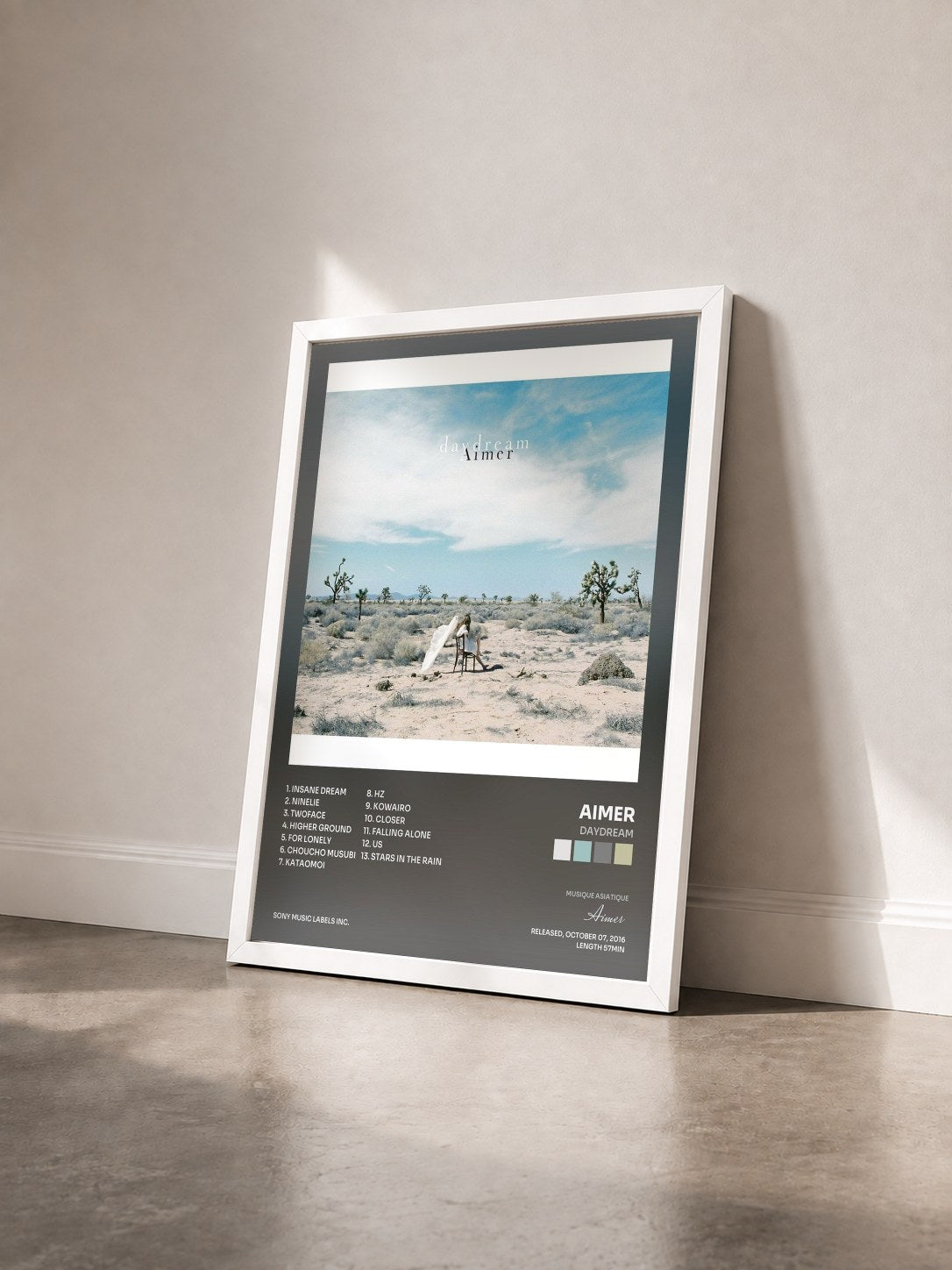 #blanc Tableau de l'album daydream de Aimer vu de trois quarts, cadre blanc