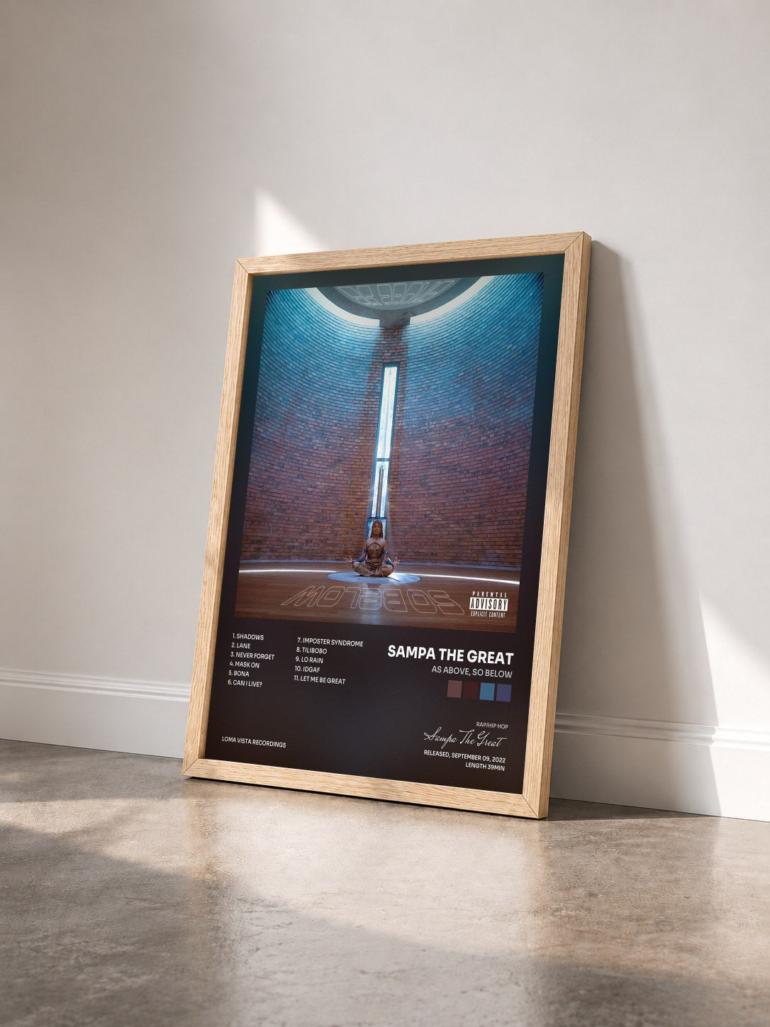 #bois Tableau de l'album As Above, So Below de Sampa The Great vu de trois quarts, cadre en bois brut