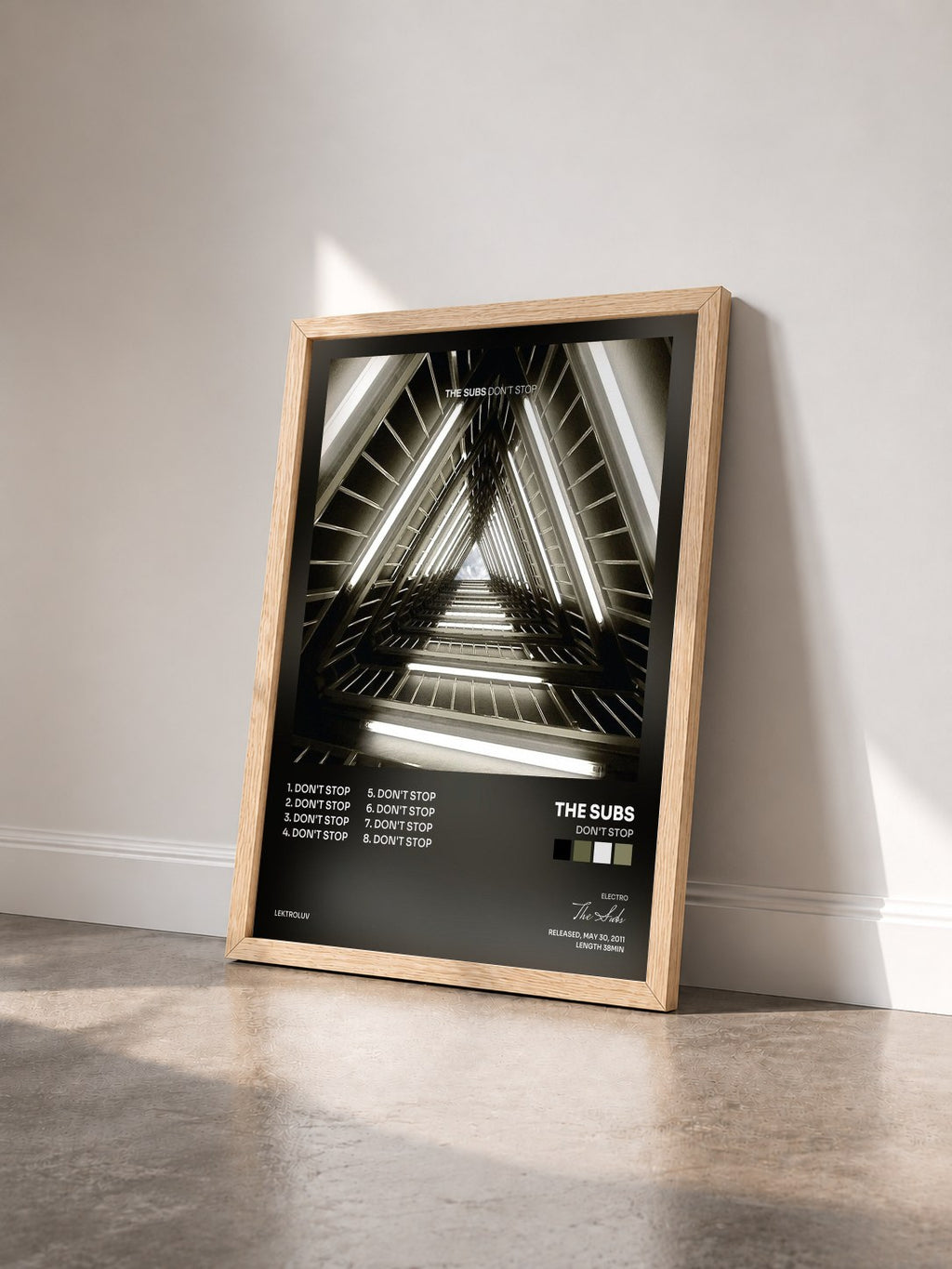 #bois Tableau de l'album Don't Stop de The Subs vu de trois quarts, cadre en bois brut