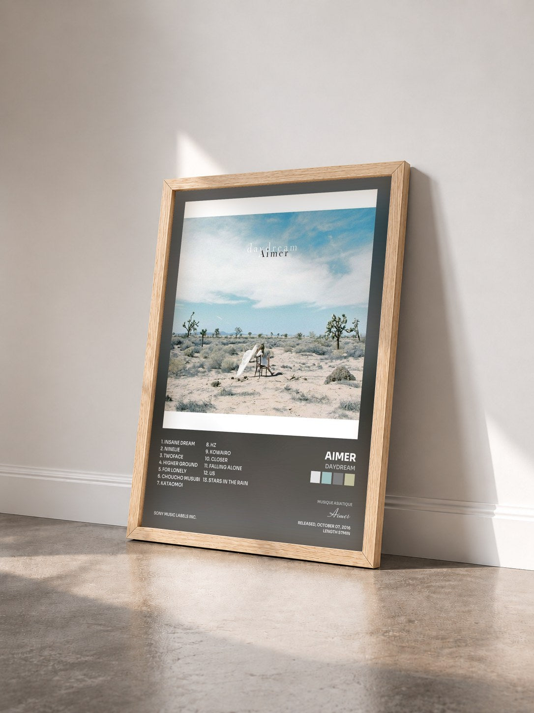 #bois Tableau de l'album daydream de Aimer vu de trois quarts, cadre en bois brut