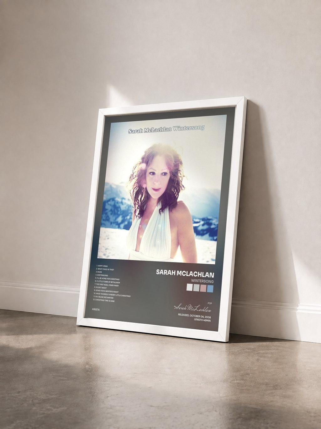 #blanc Tableau de l'album Wintersong de Sarah McLachlan vu de trois quarts, cadre blanc