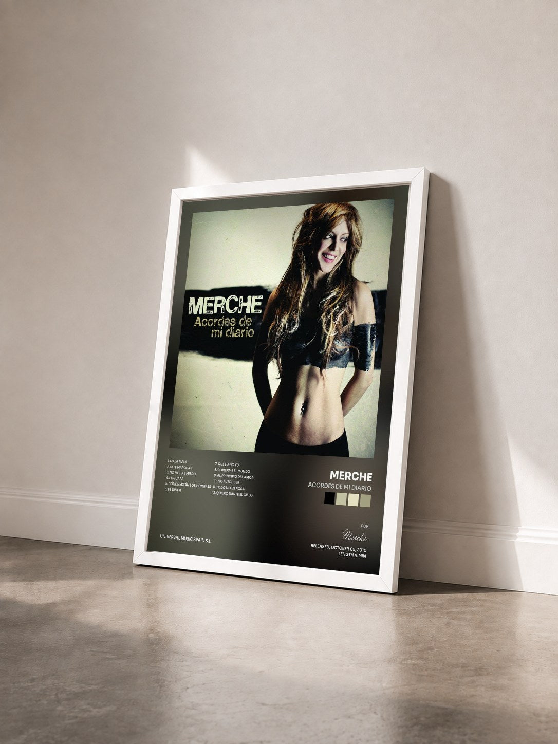 #blanc Tableau de l'album Acordes De Mi Diario de Merche vu de trois quarts, cadre blanc