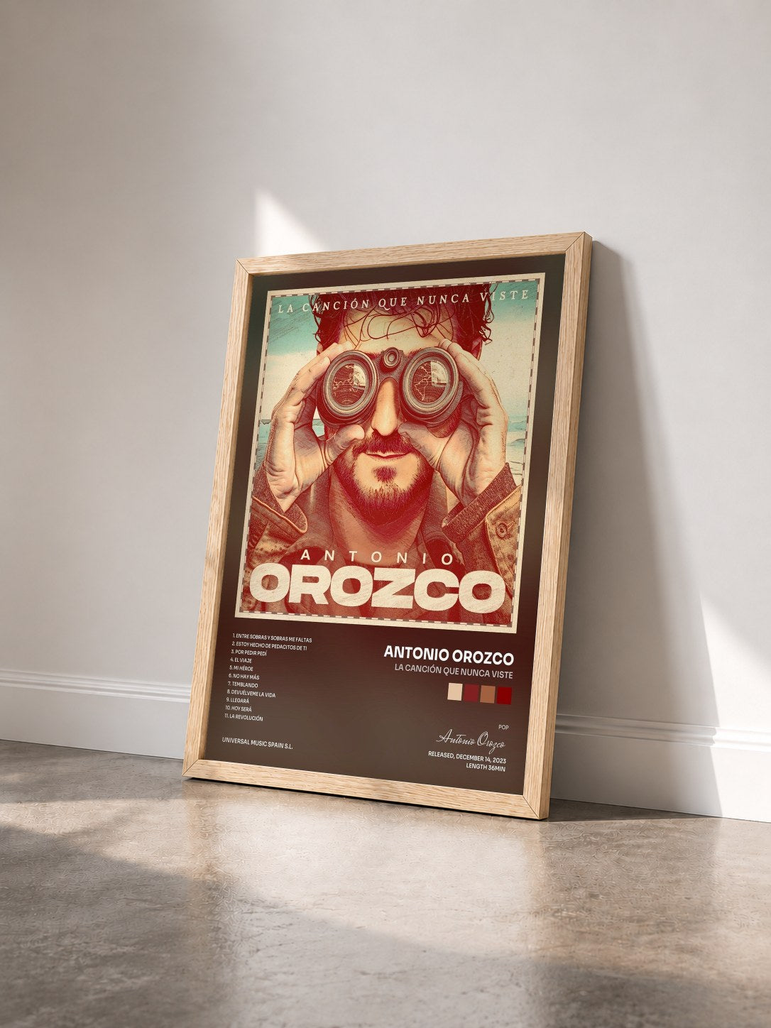 #bois Tableau de l'album La Canción Que Nunca Viste de Antonio Orozco vu de trois quarts, cadre en bois brut