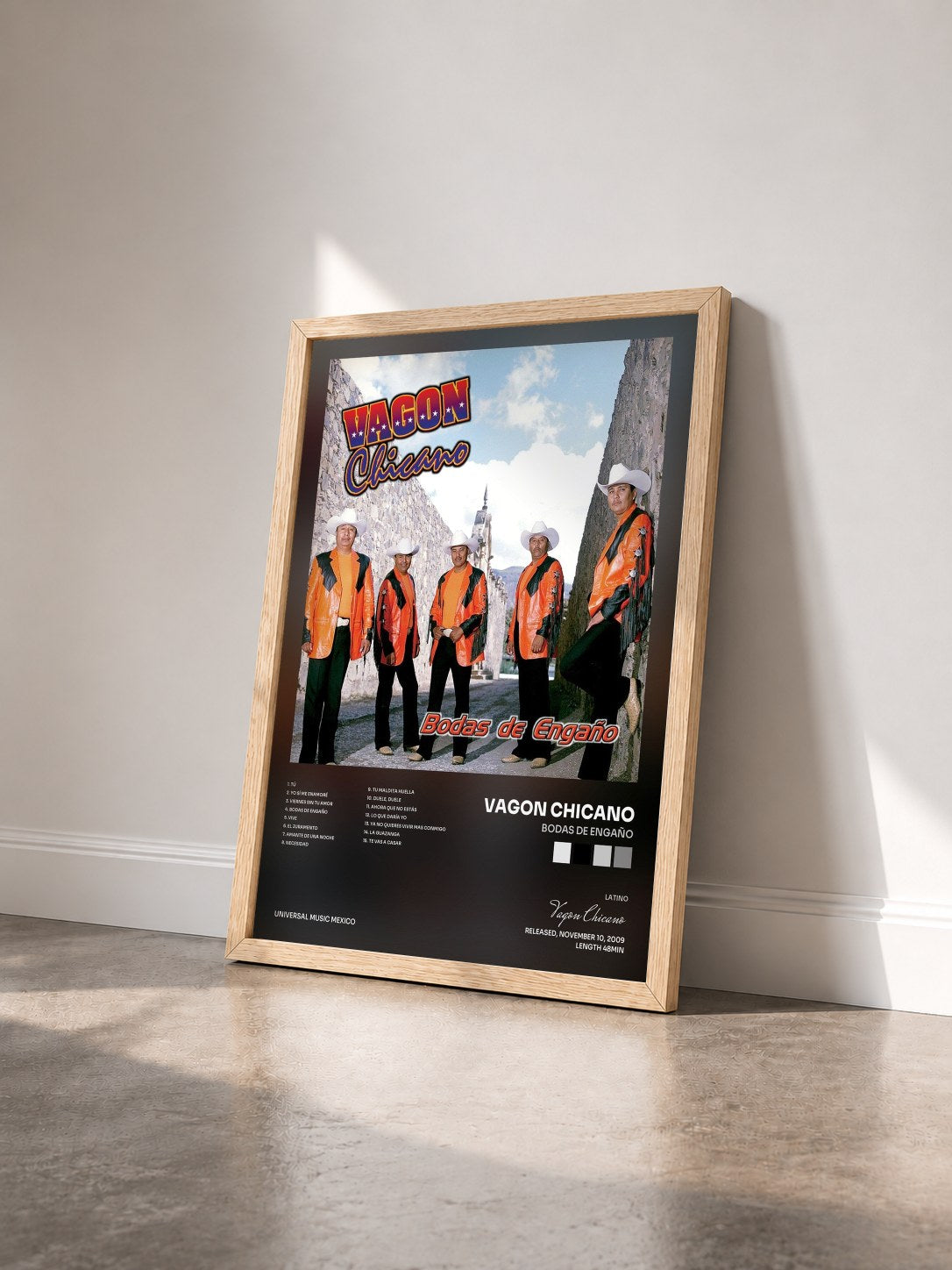 #bois Tableau de l'album Bodas De Engaño de Vagon Chicano vu de trois quarts, cadre en bois brut